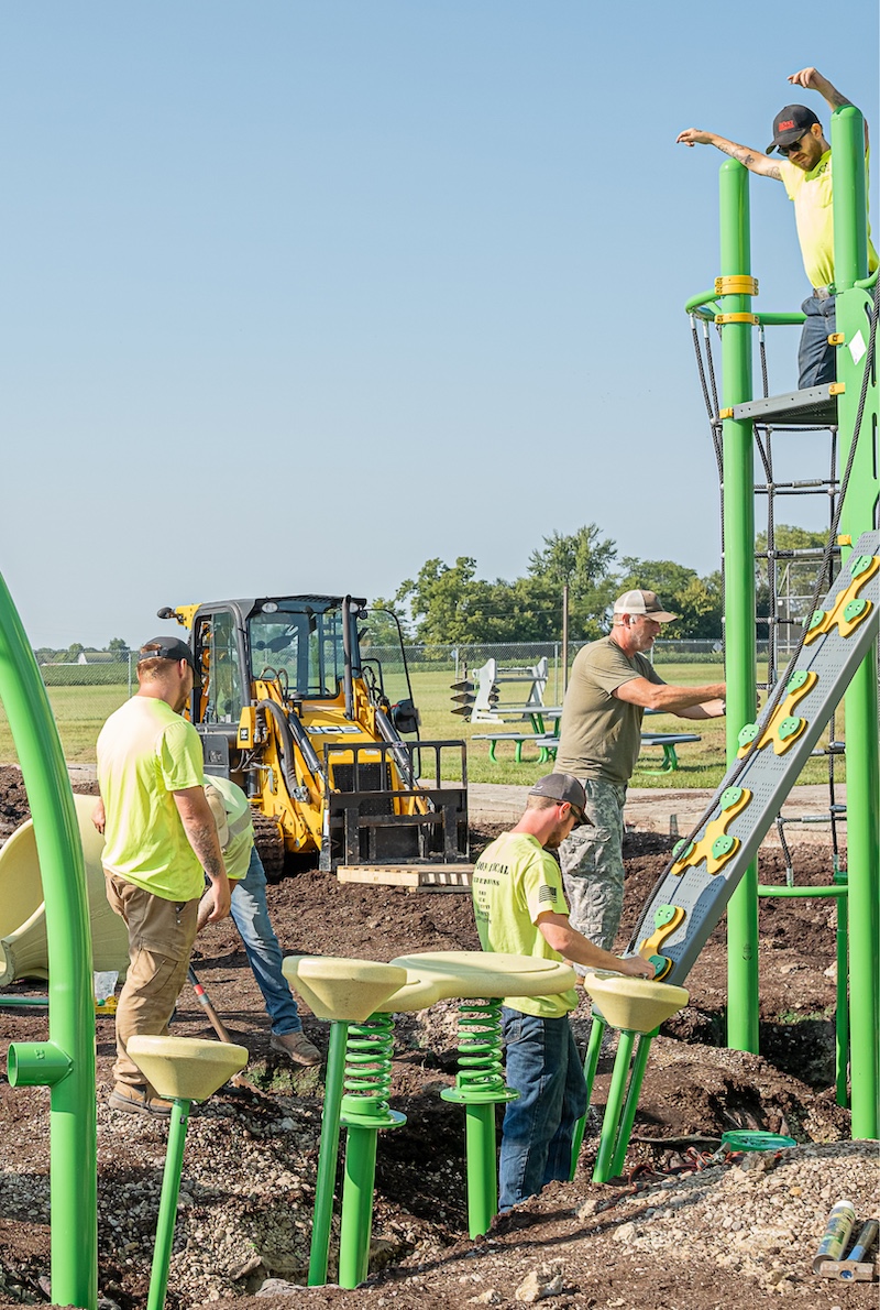 A playground being built by people