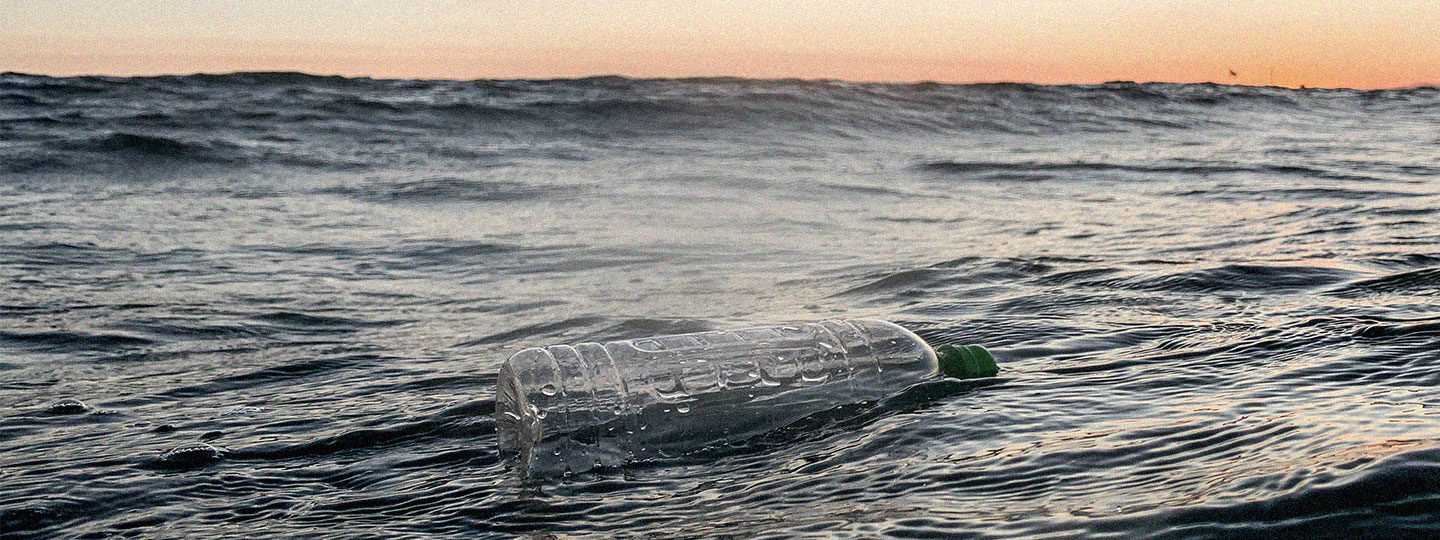 Plastic Bottle Floating in Ocean